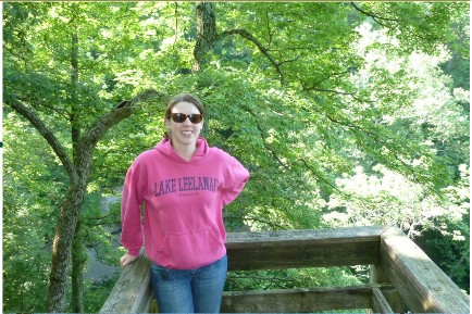 Erin Murphy standing beside a bridge