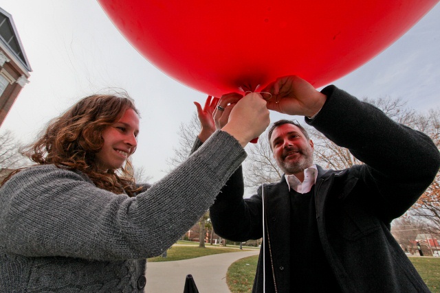 crampton with balloon and students