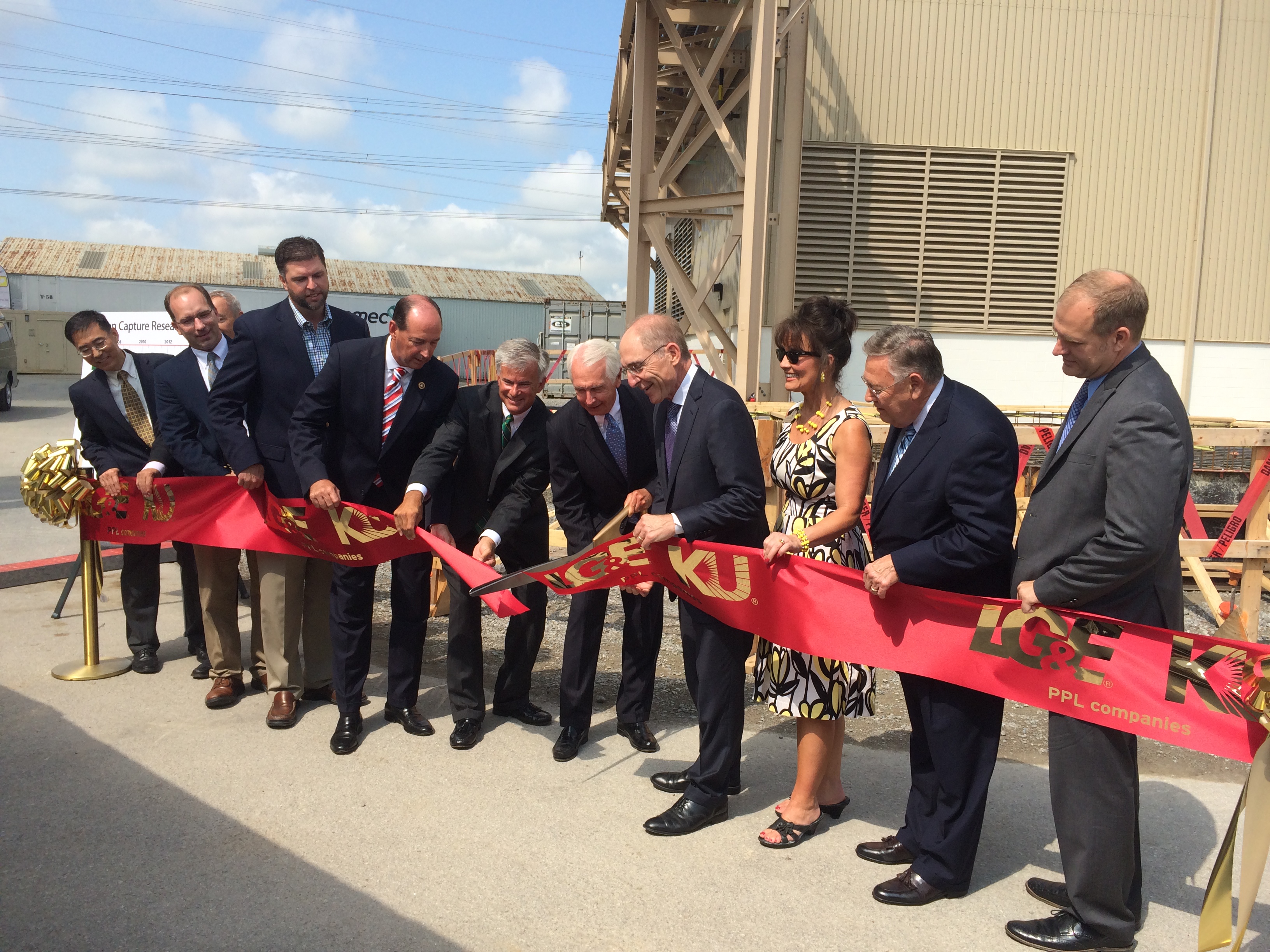 Gov. Steve Beshear (fifth from right) cut the ribbon to begin construction of Kentucky's first megawatt-scale carbon capture pilot unit at an operating power plant located at Kentucky Utilities Company’s E.W. Brown Generating Station, near Harrodsburg.