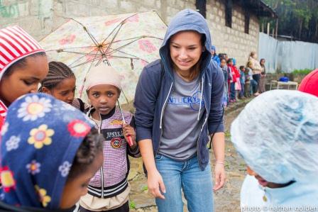 Emily Holsopple with children in Ethiopia.