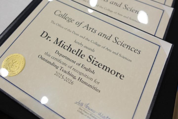 College of Arts and Sciences faculty gather to be honored and awarded. 