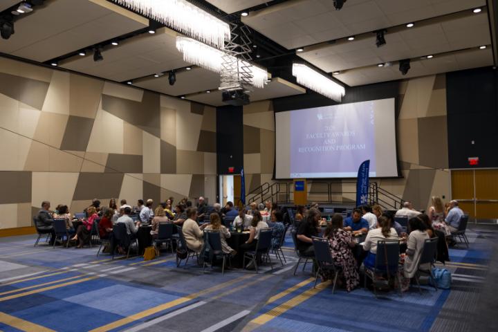 College of Arts and Sciences faculty gather to be honored and awarded. 