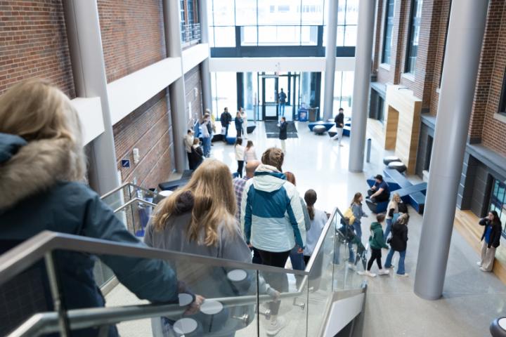 Students and parents tour the university during Admitted Students Day 2026 and speak to teachers and staff. 