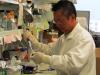 Dr. Peter Zhou found that triple-negative breast cancer cells are missing a key enzyme that other cancer cells contain.