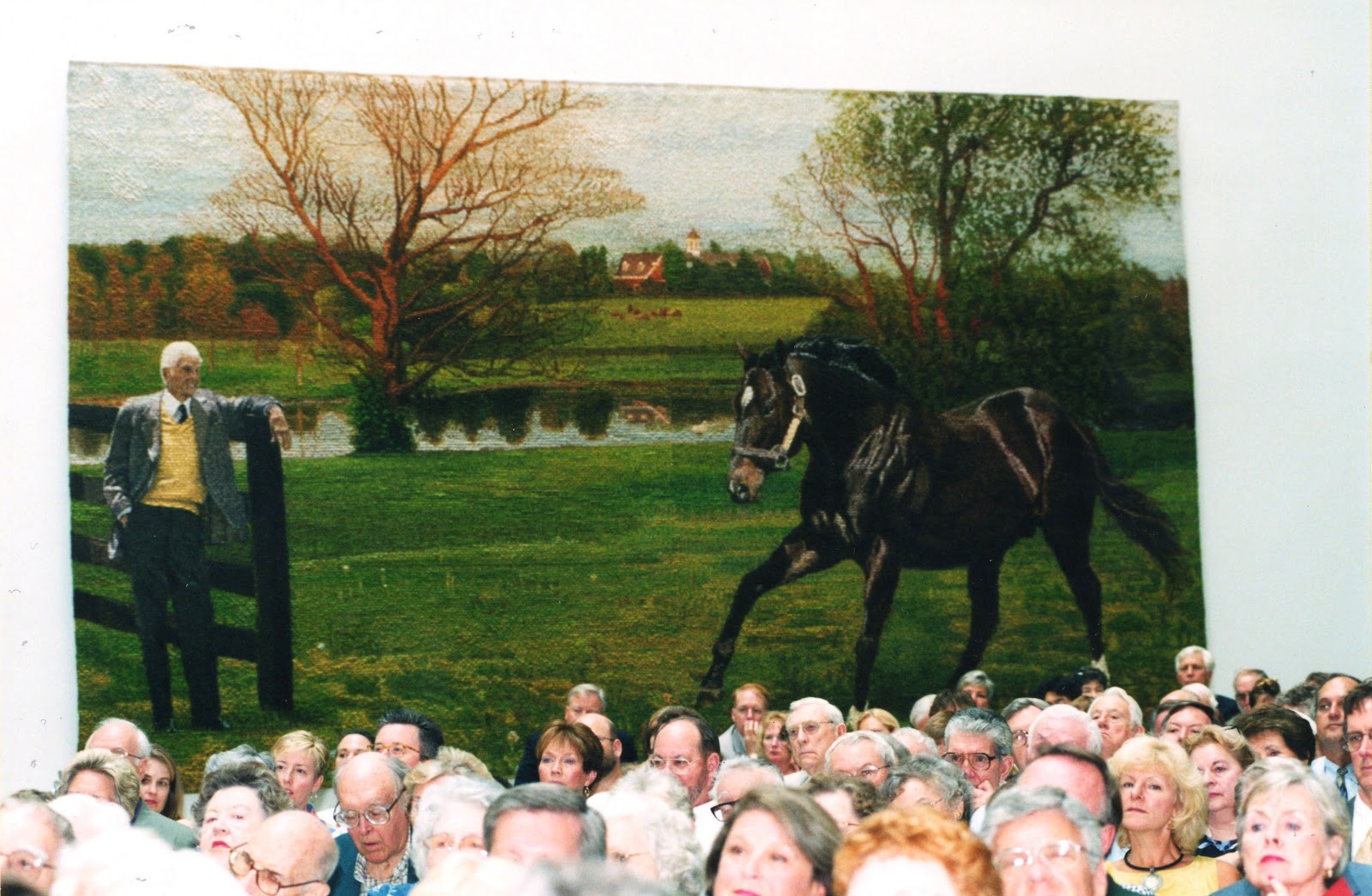 The William T. Young Library is full of treasures. Among those is the tapestry of William T. Young and his stallion, Storm Cat, on Overbrook Farm. 